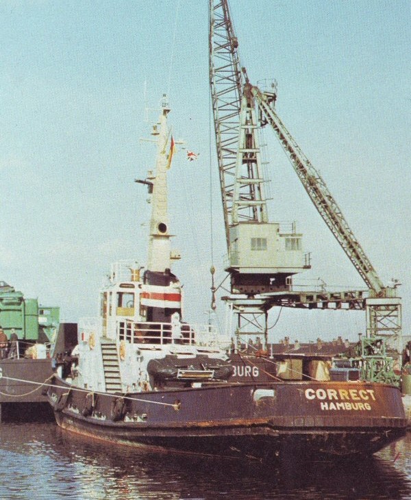 Scotch derrick crane in Stanhope Dock loading North Sea Oil equipment